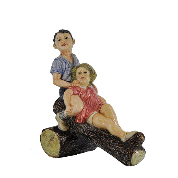 Boy and Girl Sitting on a Log